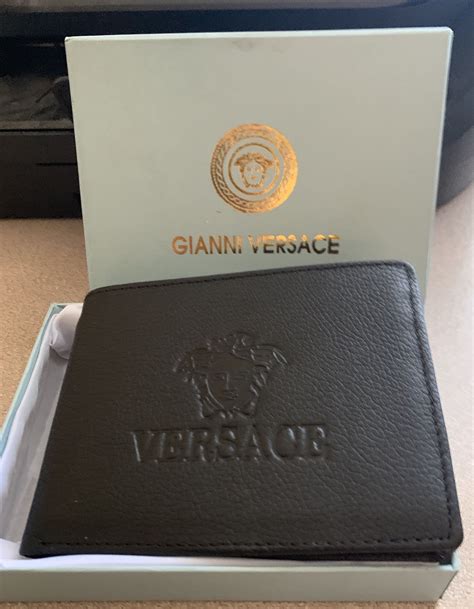 vintage versace wallet|Versace wallet medusa.